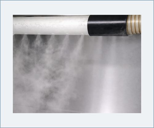 Perforated smoke manifold distributing visible fog evenly across the airflow face for airflow visualization.